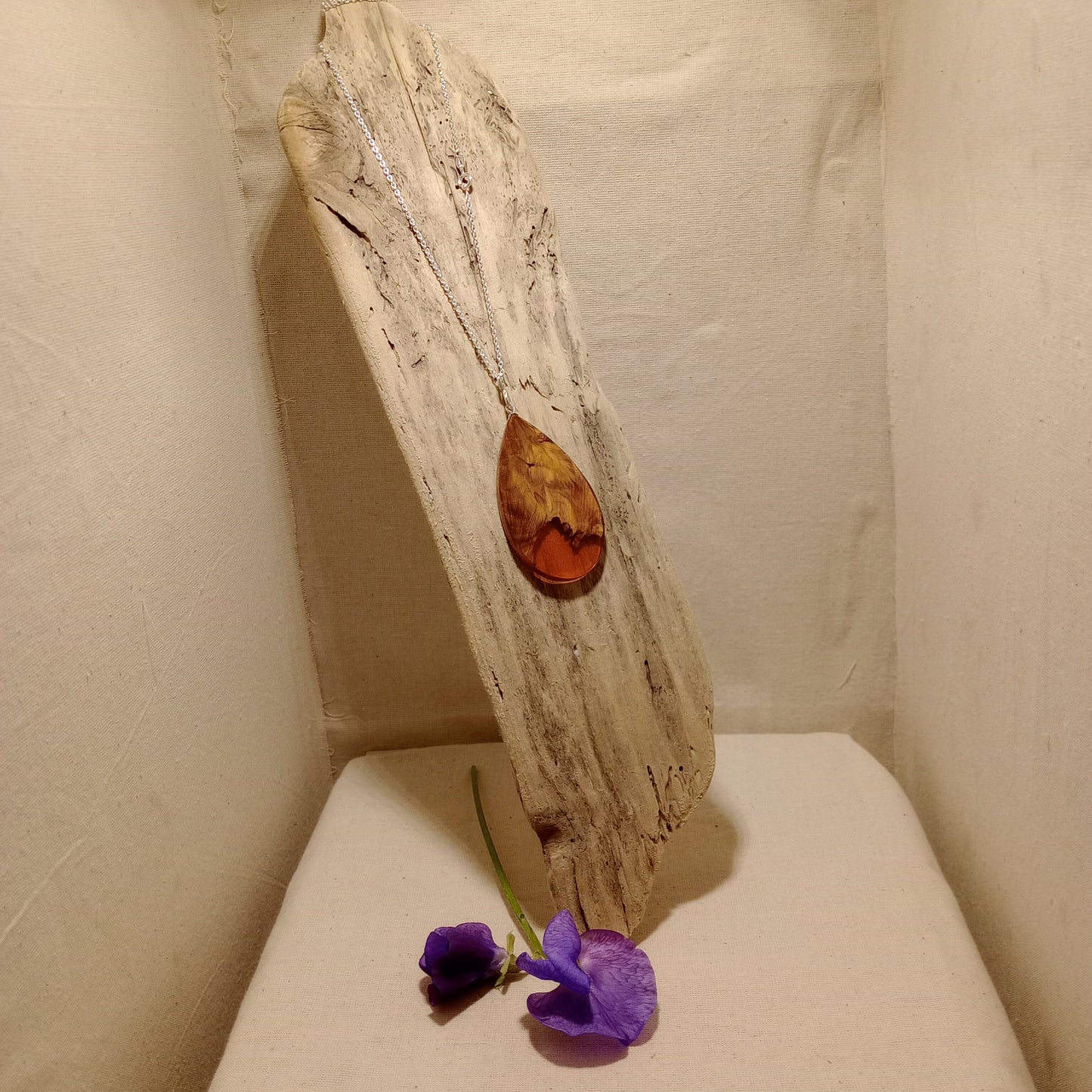 Cherry burl with resin pendant